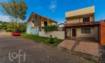 Casa com 2 quartos à venda na Rua Ari Peixoto Martins, 51, Espírito Santo, Porto Alegre, 128 m2 por R$ 480.000