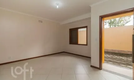 Casa em condomínio fechado com 4 quartos à venda na Rua Oiampi, 100, Guarujá, Porto Alegre, 325 m2 por R$ 655.000