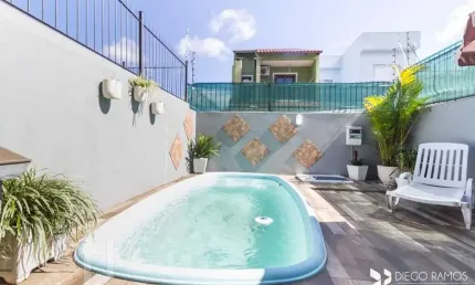 Casa com 3 quartos à venda na Rua Izar Faria Correa Sant'Anna, 91, Hípica, Porto Alegre, 149 m2 por R$ 575.000