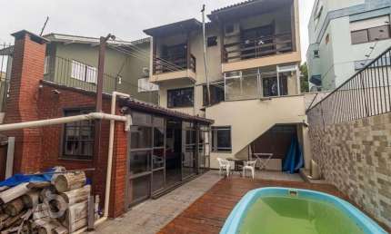Casa com 4 quartos à venda na Rua Joaquim Cruz, 30, Santo Antônio, Porto Alegre, 256 m2 por R$ 1.149.000