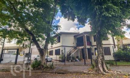 Casa com 5 quartos à venda na Rua Abílio Miller, 53, Jardim Itu Sabará, Porto Alegre, 244 m2 por R$ 800.000
