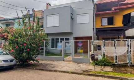 Casa em condomínio fechado com 3 quartos à venda na Rua Guatambu, 304, Hípica, Porto Alegre, 172 m2 por R$ 680.000