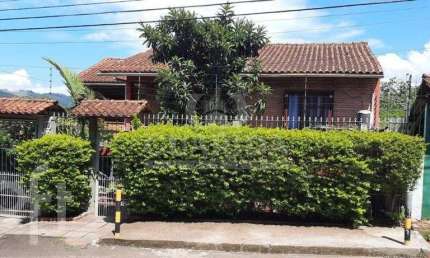 Casa com 3 quartos à venda na Rua Aleste Luiz Belocchio, 96, Nonoai, Porto Alegre, 181 m2 por R$ 550.000