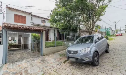 Casa com 3 quartos à venda na rua affonso fortis, 65, vila nova, porto alegre, 207 m2 por r$ 399.000