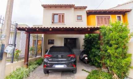 Casa com 3 quartos à venda na Rua Therezinha Rocha da Silva, 49, Hípica, Porto Alegre, 110 m2 por R$ 480.000