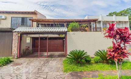 Casa com 4 quartos à venda na Rua Lloyd de Andrade Polidoro, 45, Ipanema, Porto Alegre, 237 m2 por R$ 803.225