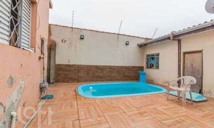 Casa com 7 quartos à venda na Rua Doutor Telmo Vergara, 832, Partenon, Porto Alegre, 440 m2 por R$ 1.045.000