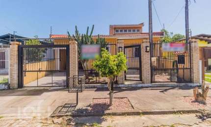 Casa com 3 quartos à venda na Rua Carmense, 165, Rubem Berta, Porto Alegre, 218 m2 por R$ 650.000