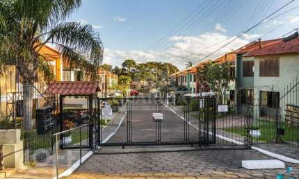 Casa em condomínio fechado com 3 quartos à venda na Avenida Juca Batista, 4075, Hípica, Porto Alegre, 99 m2 por R$ 390.000