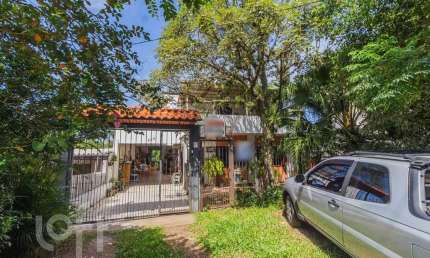 Casa em condomínio fechado com 5 quartos à venda na Avenida Vicente Monteggia, 2231, Vila Nova, Porto Alegre, 308 m2 por R$ 905.000
