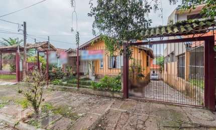 Casa com 3 quartos à venda na Rua Hugo Nelson Magalhães, 70, Rubem Berta, Porto Alegre, 200 m2 por R$ 480.000