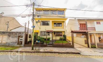 Casa com 6 quartos à venda na Rua Monte Arraes, 232, Nonoai, Porto Alegre, 256 m2 por R$ 800.000