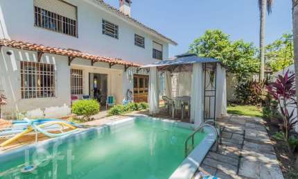 Casa com 4 quartos à venda na Rua Doutor Raul Moreira, 354, Cristal, Porto Alegre, 180 m2 por R$ 950.000