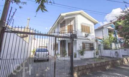 Casa com 3 quartos à venda na Rua Vera Cruz, 391, Vila Ipiranga, Porto Alegre, 147 m2 por R$ 1.190.000