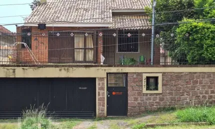 Casa com 3 quartos à venda na Avenida Deputado Aramy Silva, 277, Santa Tereza, Porto Alegre, 154 m2 por R$ 945.000