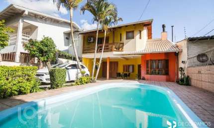 Casa com 4 quartos à venda na Rua Cacilda Yaconis Becker, 223, Rubem Berta, Porto Alegre, 300 m2 por R$ 693.500