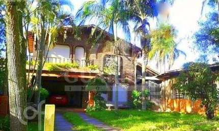 Casa com 3 quartos à venda na Estrada João Vedana, 561, Cavalhada, Porto Alegre, 200 m2 por R$ 905.000