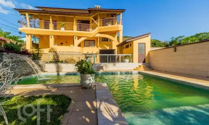 Casa com 4 quartos à venda na Rua Maurílio Ferreira, 320, Campo Novo, Porto Alegre, 320 m2 por R$ 1.850.000