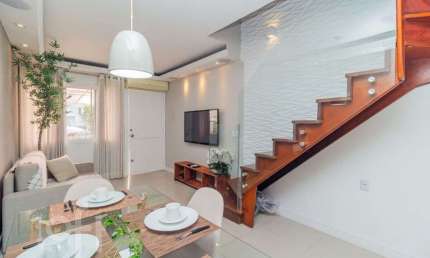Casa em condomínio fechado com 2 quartos à venda na Rua Guilherme Schell, 1250, Santo Antônio, Porto Alegre, 76 m2 por R$ 317.300