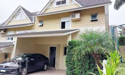 Casa em condomínio fechado com 4 quartos à venda na Avenida Engenheiro Ludolfo Boehl, 1179, Teresópolis, Porto Alegre, 208 m2 por R$ 980.000