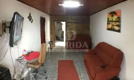 Casa com 2 quartos à venda na Rua Professor Rubens Guelli, 105, Vila Nova, Porto Alegre, 200 m2 por R$ 400.100