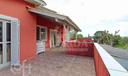 Casa com 4 quartos à venda na Avenida Cinco de Novembro, 346, Teresópolis, Porto Alegre, 180 m2 por R$ 490.000