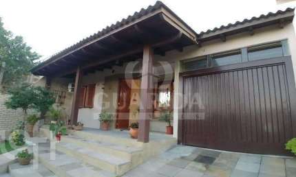Casa com 3 quartos à venda na Rua Francisco Mattos Terres, 80, Hípica, Porto Alegre, 148 m2 por R$ 520.000