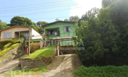 Casa com 5 quartos à venda na Avenida Professor Oscar Pereira, 6798, Cascata, Porto Alegre, 280 m2 por R$ 500.000