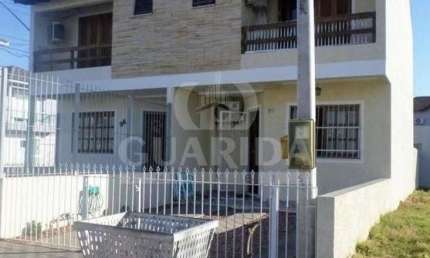 Casa em condomínio fechado com 3 quartos à venda na Rua Embira, 98, Hípica, Porto Alegre, 110 m2 por R$ 498.000