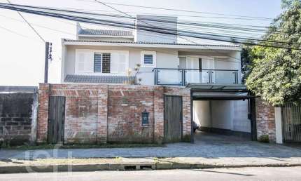 Casa com 6 quartos à venda na Rua Arapei, 228, Nonoai, Porto Alegre, 500 m2 por R$ 1.200.000