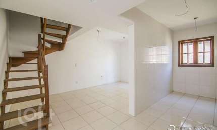 Casa em condomínio fechado com 3 quartos à venda na Rua São Sebastião do Cai, 119, Camaquã, Porto Alegre, 118 m2 por R$ 379.000