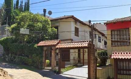 Casa em condomínio fechado com 2 quartos à venda na Rua Coronel João Pinto, 185, Nonoai, Porto Alegre, 129 m2 por R$ 550.000