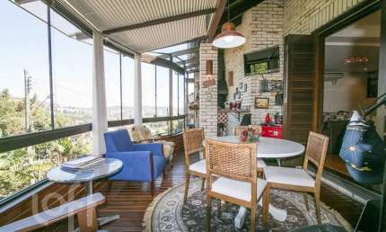 Casa em condomínio fechado com 4 quartos à venda na Rua Erechim, 100, Nonoai, Porto Alegre, 331 m2 por R$ 1.050.000