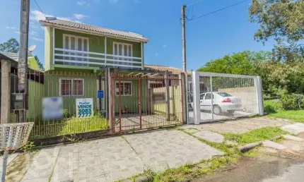 Casa com 3 quartos à venda na Avenida Nossa Senhora de Guadalupe, 970, Hípica, Porto Alegre, 103 m2 por R$ 372.000