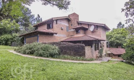 Casa com 3 quartos à venda na Estrada Júlio Antônio Pereira, 180, Hípica, Porto Alegre, 500 m2 por R$ 1.900.000