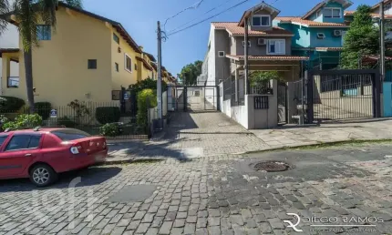 Casa em condomínio fechado com 3 quartos à venda na Rua Padre João Batista Reus, 2133, Camaquã, Porto Alegre, 152 m2 por R$ 470.000