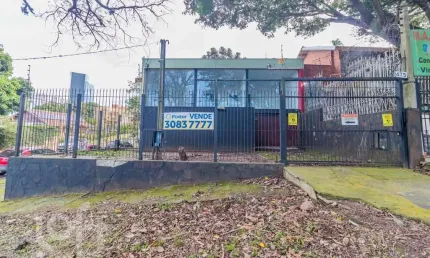 Casa com 3 quartos à venda na Avenida Capivari, 240, Cristal, Porto Alegre, 319 m2 por R$ 812.250
