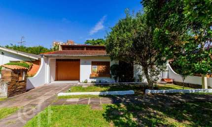 Casa em condomínio fechado com 3 quartos à venda na Rua Doutor Campos Velho, 1245, Cavalhada, Porto Alegre, 165 m2 por R$ 655.500