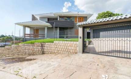 Casa com 3 quartos à venda na Rua Doutor Paulino Guerra, 362, Jardim Itu Sabará, Porto Alegre, 258 m2 por R$ 1.290.000