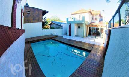 Casa em condomínio fechado com 4 quartos à venda na Rua Professor Antônio José Remião, 15, Espírito Santo, Porto Alegre, 297 m2 por R$ 890.000