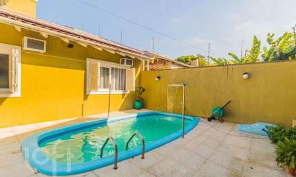 Casa com 4 quartos à venda na Avenida Mário Meneghetti, 694, Passo das Pedras, Porto Alegre, 460 m2 por R$ 1.800.000