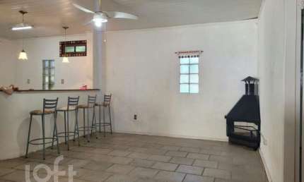 Casa com 2 quartos à venda na Rua Lauro Rodrigues, 405, Rubem Berta, Porto Alegre, 56 m2 por R$ 260.000