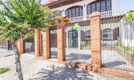Casa com 5 quartos à venda na Travessa Kuluene, 399, Coronel Aparício Borges, Porto Alegre, 386 m2 por R$ 800.000