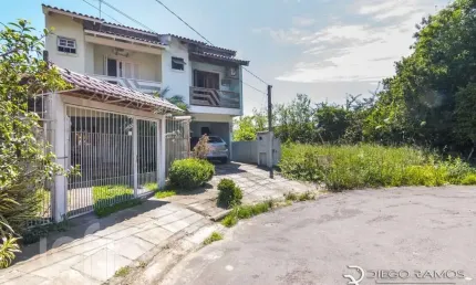 Casa com 2 quartos à venda na Rua Michael Motta Seelig, 58, Hípica, Porto Alegre, 112 m2 por R$ 324.900