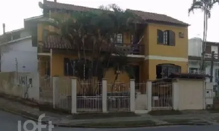 Casa com 3 quartos à venda na Avenida Celestino Bertolucci, 115, Hípica, Porto Alegre, 306 m2 por R$ 979.900