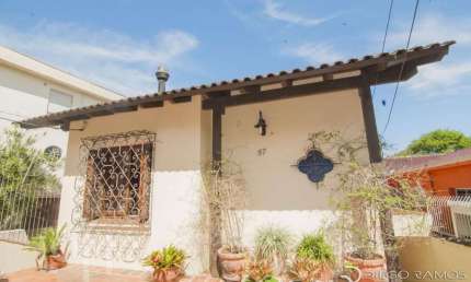 Casa com 3 quartos à venda na Rua General Oliveira Freitas, 57, Santa Tereza, Porto Alegre, 300 m2 por R$ 900.000