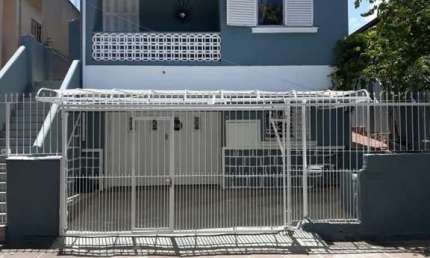 Casa com 4 quartos à venda na Avenida Carneiro da Fontoura, 307, Jardim São Pedro, Porto Alegre, 390 m2 por R$ 890.000