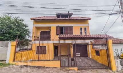 Casa com 4 quartos à venda na Travessa Clemêncio Wallau, 24, Coronel Aparício Borges, Porto Alegre, 484 m2 por R$ 780.000