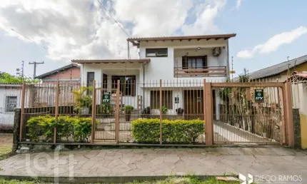 Casa com 4 quartos à venda na Avenida Frei Henrique de Coimbra, 84, Vila Ipiranga, Porto Alegre, 270 m2 por R$ 1.425.000