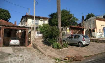 Casa com 3 quartos à venda na Avenida Paulo Pontes, 628, Cavalhada, Porto Alegre, 310 m2 por R$ 490.000